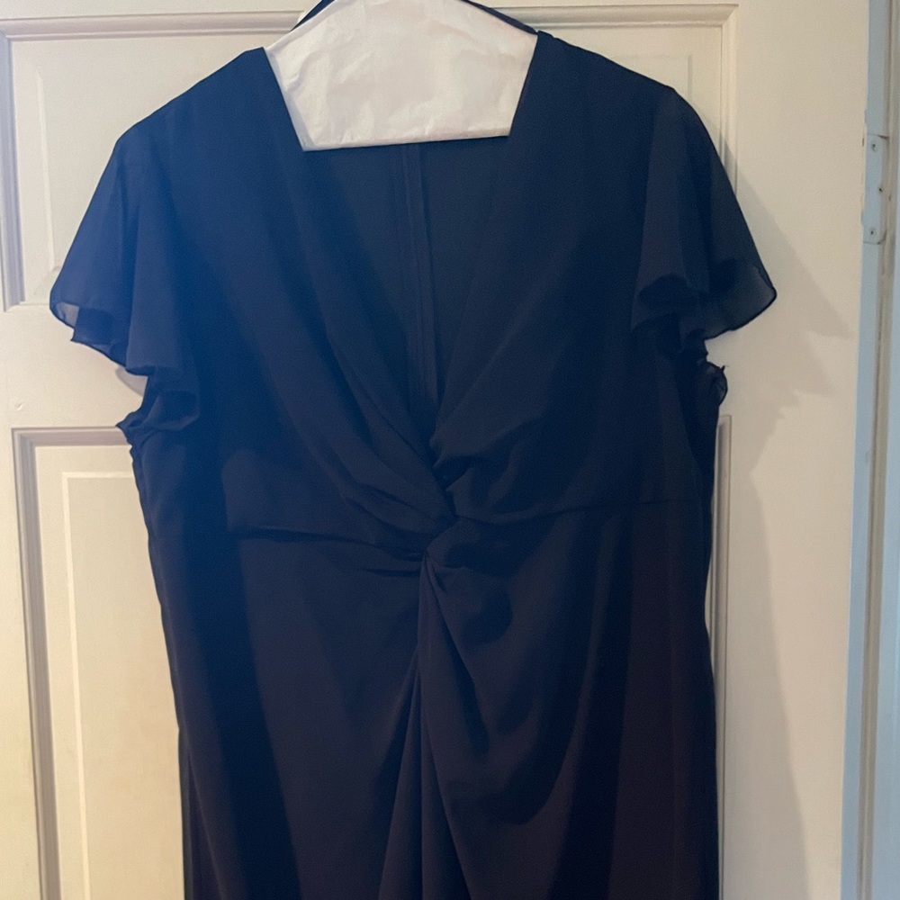Beautiful black cocktail dress with flutter sleeves.  Classic